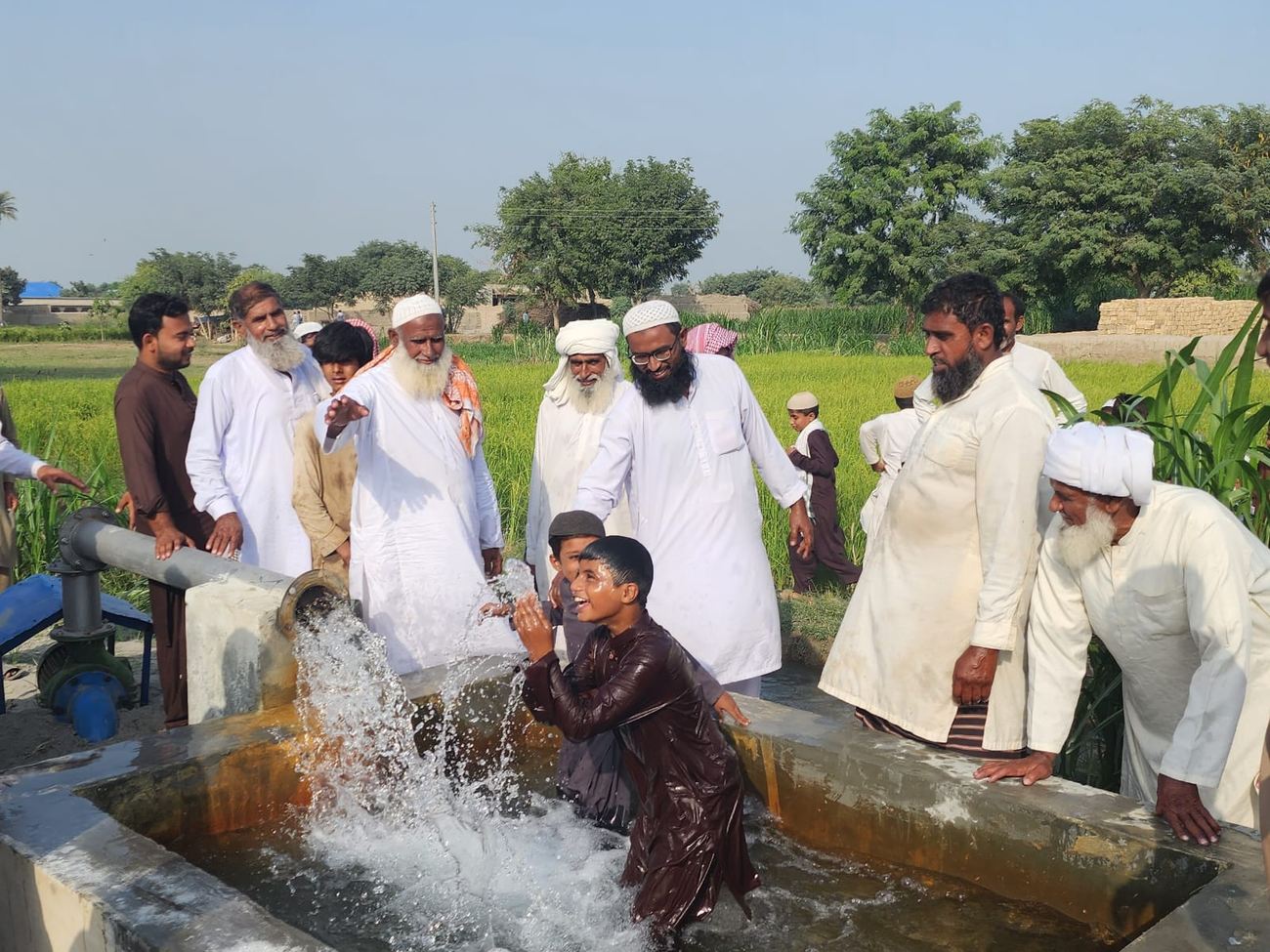 Villagers at the tube well